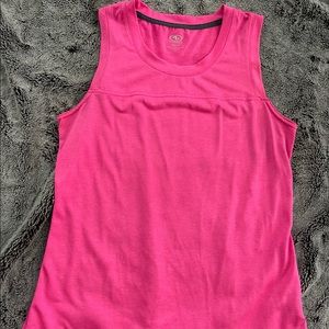 Bright pink sleeved workout or running tank.